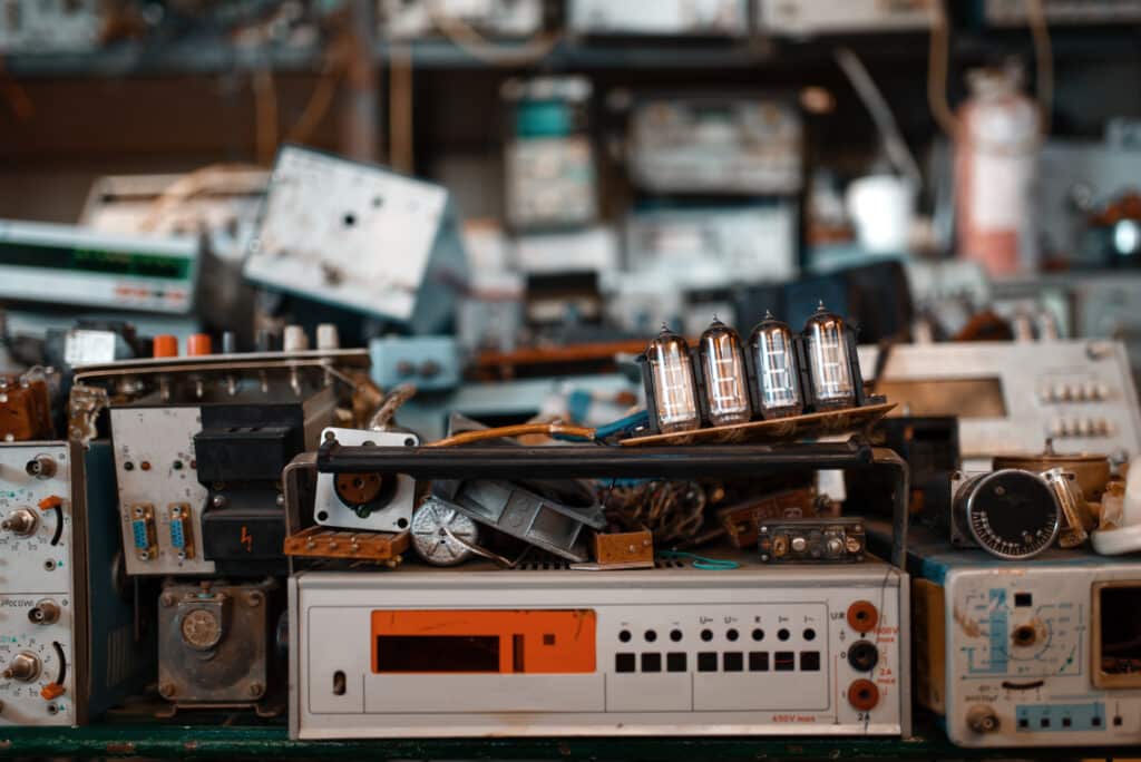 a bunch of electronic equipment sitting on top of a table